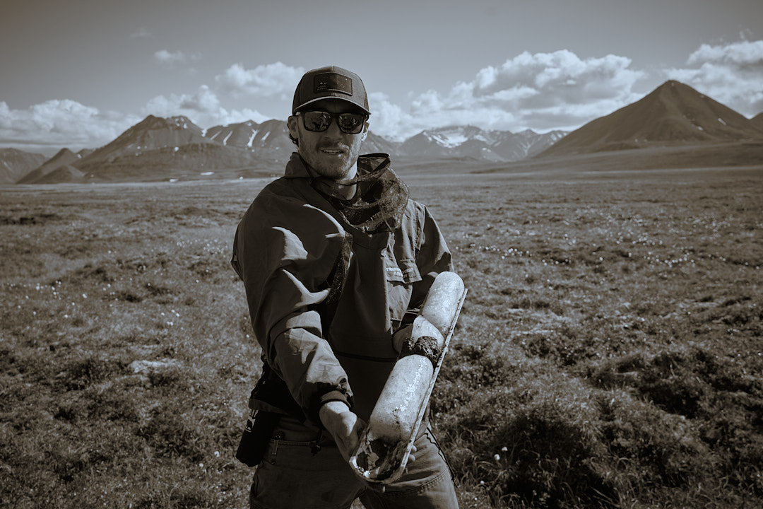 Holding a permafrost core near Galbraith Lake, AK
